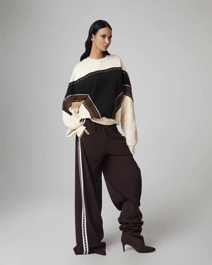Pantalone con borchie odi et amo