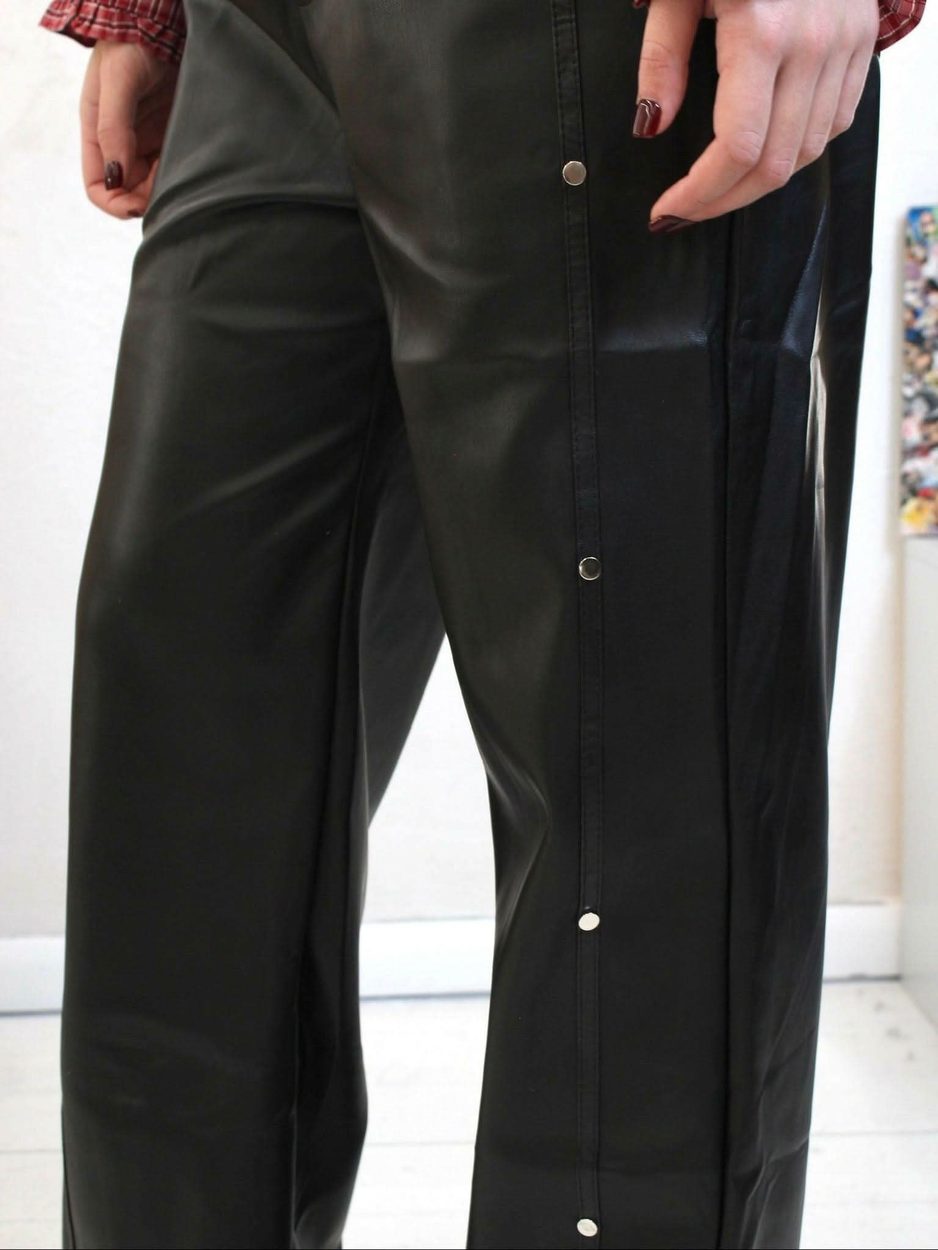 Salopette nera - THE SECRET LOFT